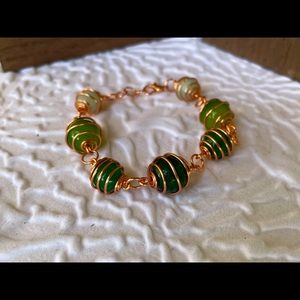 Copper wrapped green glass beaded medium bracelet